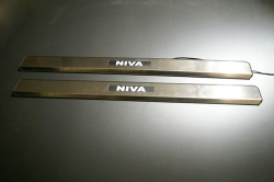 niva,накладки на пороги с подсветкой niva,светящиеся накладки на пороги niva,светодиодные накладки на пороги niva,светодиодные накладки на пороги авто niva,накладки на пороги led niva,декоративные накладки на пороги с подсветкой niva,накладки на пороги с 