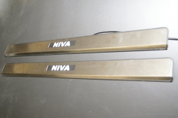 niva,накладки на пороги с подсветкой niva,светящиеся накладки на пороги niva,светодиодные накладки на пороги niva,светодиодные накладки на пороги авто niva,накладки на пороги led niva,декоративные накладки на пороги с подсветкой niva,накладки на пороги с 