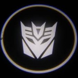 Подсветка логотипа в двери DETEPTICON,подсветка дверей с логотипом DETEPTICON,Штатная подсветка DETEPTICON,подсветка дверей с логотипом авто DETEPTICON,светодиодная подсветка логотипа DETEPTICON в двери,Лазерные проекторы DETEPTICON в двери,Лазерная подсв