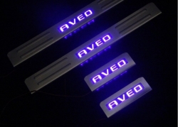 накладки на пороги с подсветкой Chevrolet aveo,светящиеся накладки на пороги Chevrolet aveo,светодиодные накладки на пороги Chevrolet aveo,светодиодные накладки на пороги авто Chevrolet aveo,накладки на пороги led Chevrolet aveo,декоративные накладки aveo