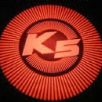 Подсветка логотипа в двери KIA,подсветка дверей с логотипом KIA,Штатная подсветка KIA,подсветка дверей с логотипом авто KIA,светодиодная подсветка логотипа KIA в двери,Лазерные проекторы KIA в двери,Лазерная подсветка KIA