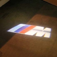 Штатные проекторы в двери BMW M 7W